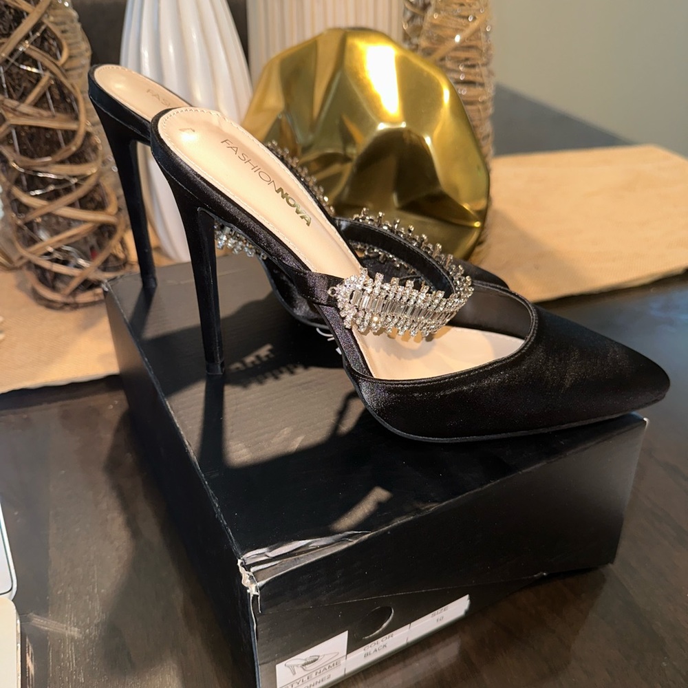 Black, pump, pointed toe, embellished detail, satin, 4.5 inch stiletto heel.